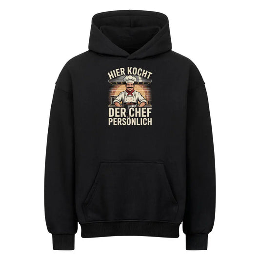 Hier kocht der Chef persönlich - Oversized Hoodie – Motivdruck in Schwarz